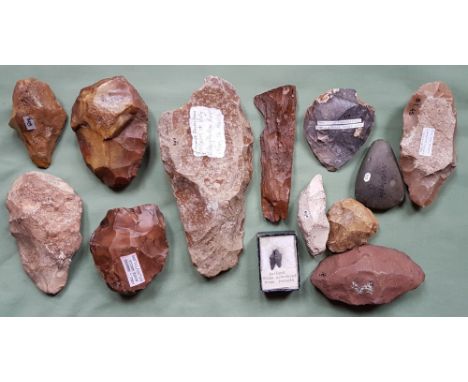 A large collection of prehistoric stone hand axes etc., mainly found in France, including one very large Paleolithic hand axe