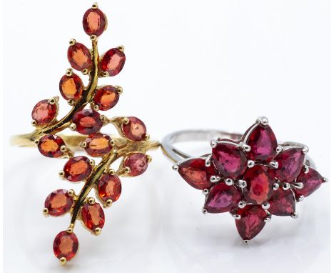 Two hallmarked 9ct gold&nbsp; and AAA Tanzanian ruby rings. A 9ct white gold ring set with 8 pear cut ruby (approx 2.79ct) We