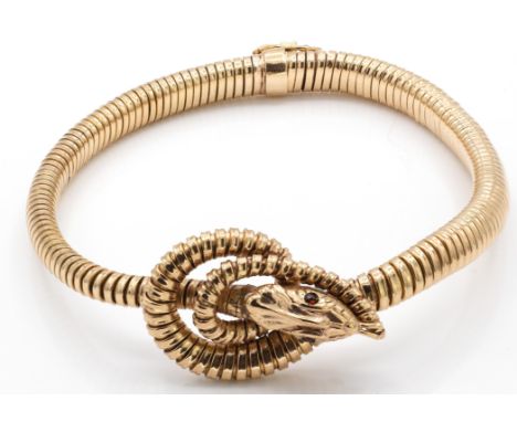 A hallmarked 9ct gold gas pipe ouroboros serpent - snake bangle, The bangled formed of gas pipe links having a gem set head w