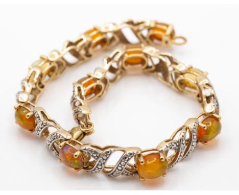 A hallmarked&nbsp; 9ct gold diamond and Welo opal bracelet. The bracelet set with 10 oval opal cabochons with pave set diamon