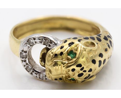 18ct gold emerald and diamond figural leopard ring. The ring set with emerald eyes holding a brilliant cut diamond set ring w