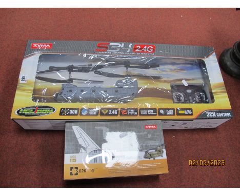 Two Syma Boxed Chinook R/C Helicopters, a Ref No S34 and Ref No S026 both very good u/t condition, very good boxes.