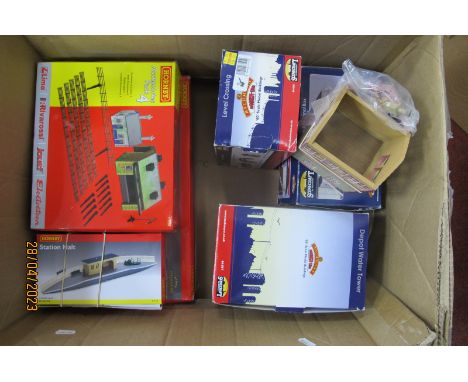 A Hornby 'OO' Gauge/4mm Ref No R8009 Boxed Station Terminus, plus a Ref No R8230 No 4 accessory pack, a R590 station halt; th