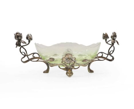 ​​A WMF pewter centrepiece, c.1900, with sinuous scrolled handles and a green glass liner, 49cm wideCondition ReportWear to t