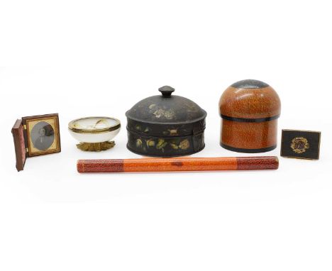 A Kashmiri lacquered pot and cover, 20th century, enclosing five graduated pots and covers, 13cm high, a similar ruler, 32.5c