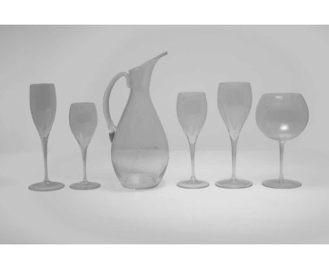 A suite of Baccarat drinking glasses, 20th century, plain design, comprising 10 champagne, 21.5cm high, 12 red wine, 22cm hig