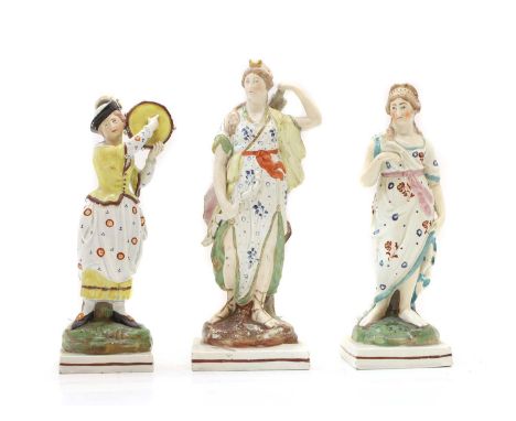 Three Staffordshire pottery figures, early 19th century, with enamel decoration, 'Diana' the huntress on a square base, 30cm 