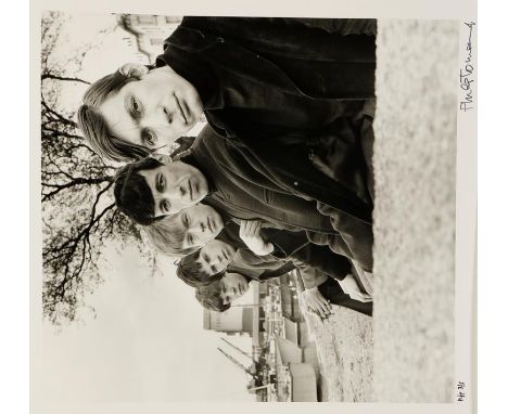 •PHILLIP TOWNSEND A photograph of The Rolling Stones, their first photo shoot at Chelsea Harbour, ink signature lower right, 