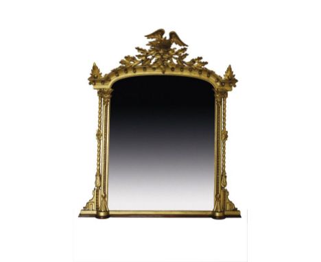 AN EARLY VICTORIAN GILT FRAMED OVER MANTLE MIRROR, the arched topped bevel edged plate within a gilt surround with spiral tur