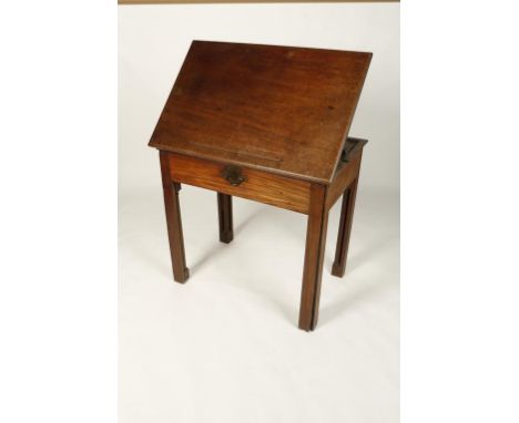 A GEORGE III MAHOGANY ARCHITECTS TABLE, the rising top with easel support and candlestand above a fitted drawer with compartm