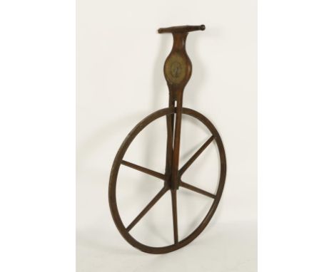 A 19TH CENTURY MAHOGANY WAYWISER OR HODOMETER, with iron bound six-spoke 32" wheel, the brass scale marked in poles, furlongs