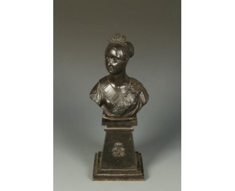 A CAST IRON PORTRAIT BUST OF QUEEN VICTORIA on a tapering stepped base with cast initials, 14" high