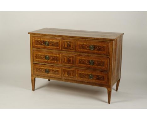 A LATE 18TH CENTURY ITALIAN MARQUETRY AND WALNUT COMMODE, the rectangular top with a central foliate motif within quarter mat