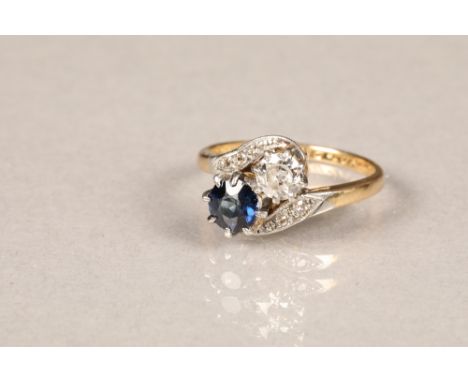 Ladies 18 carat gold diamond and sapphire ring, 0.33 diamond and 0.5 sapphire in twist setting, mounted in platinum with diam