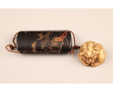 Japanese four case black lacquer inro, gilt decoration together with a carved ivory buddhist dog netsuke, 8.5cm high, 4.4cm w