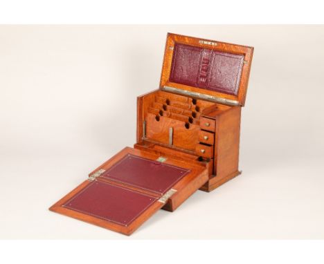 Edwardian light oak stationery and writing box, hinged cover revealing a fitted stationery compartment with a deep front and 