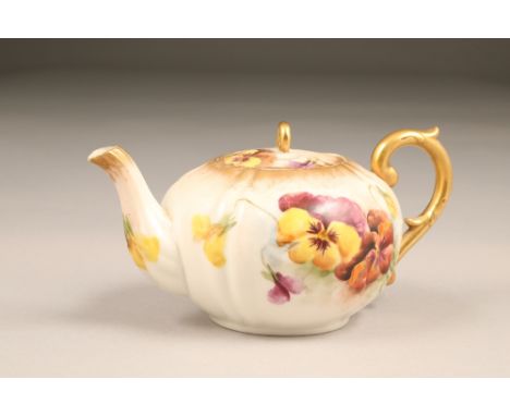 Nautilus porcelain teapot, gilt scroll teapot, hand painted in pansies.CONDITION REPORT:Teapot is in excellent condition with