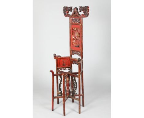Chinese red lacquer wash stand, carved dragon and flaming pearl finial over a red lacquer splash back with carved 'figure' an