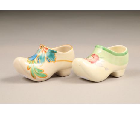 Clarice Cliff two small sabots, floral patterns, one for Newport pottery, the other for Wilkinson Ltd, 11cm long.CONDITION RE