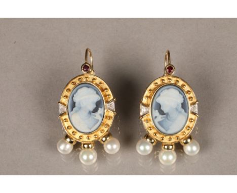 Pair 14 carat gold cameo earrings, carved oval blue cameo with a set ruby to the top, a diamond to either side with three pea