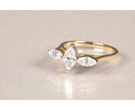 18 carat yellow gold three stone diamond ring, central 0.5 carat marquise cut diamond flanked on either side by a 0.3 carat m