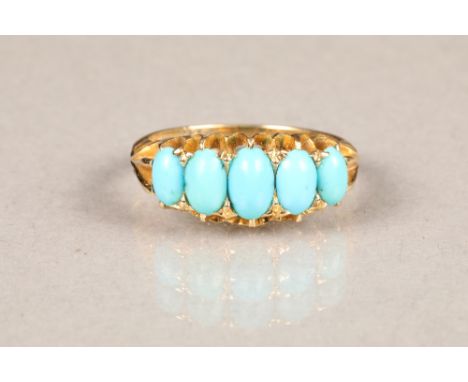 Ladies 18 carat gold ring, set with five graduated turquoise cabochons. CONDITION REPORT: The ring requires a good clean.  Th