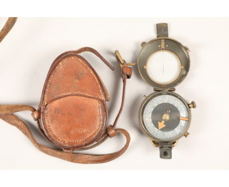 First World War officers compass, Verners pattern St Pan Gar, London No 96065, dated 1918, with a brown leather case and stra