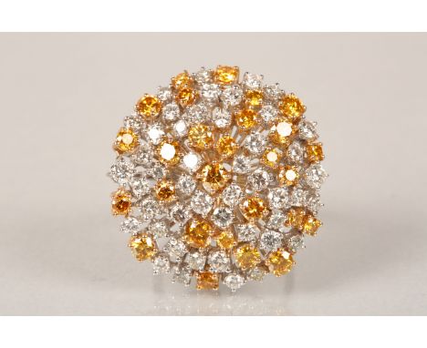 18 carat yellow and white gold, unique designer diamond cluster ring set with 73 round brilliant cut natural diamonds.&nbsp; 