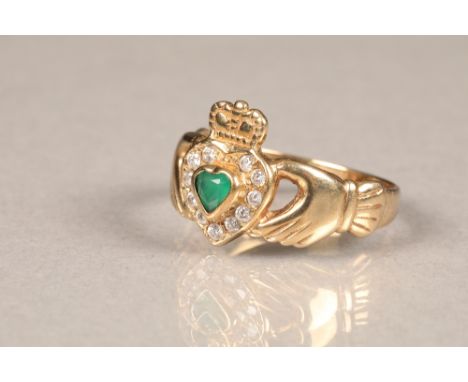 9 carat gold emerald diamond ring, heart shaped emerald surrounded by twelve small brilliant cut diamonds in a heart shaped s