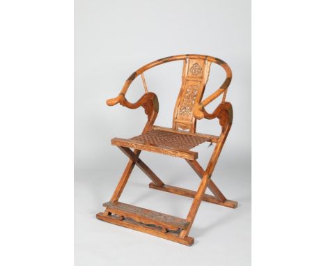 20th century Chinese hardwood horseshoe back folding armchair, 70cm wide, 70cm deep, 102cm high. CONDITION REPORT: The foldin
