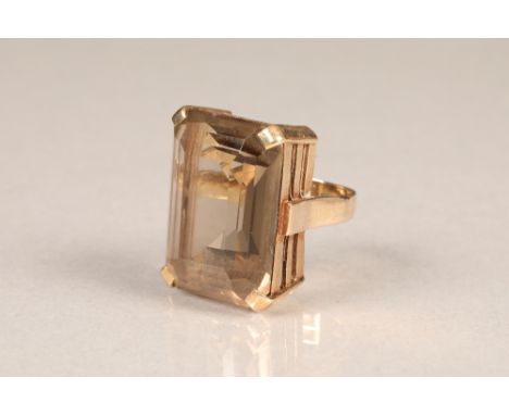 Ladies smokey quartz ring, on 9 carat yellow gold shank.  Ring size N.