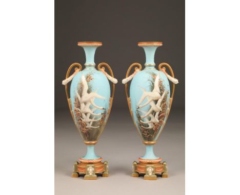 Very fine pair of Royal Worcester porcelain vases, by Charles Baldwyn, baluster form with gilt acanthus leaf handles. A sky b