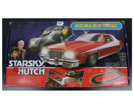 Scalextric Starsky &amp; Hutch set which includes Ford Torino and Chevrolet Corvette Cars, Mint complete UNUSED, within Good 