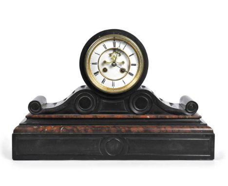 A Victorian slate mantle clock, 
cleared from the Dettori household, with Roman chapter ring and red stone details 32cm high
