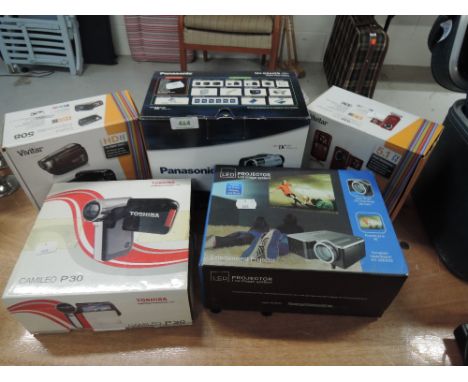 A selection of digital video cameras including LED Projector, Toshiba Camileo, Panasonic DV etc all boxed 