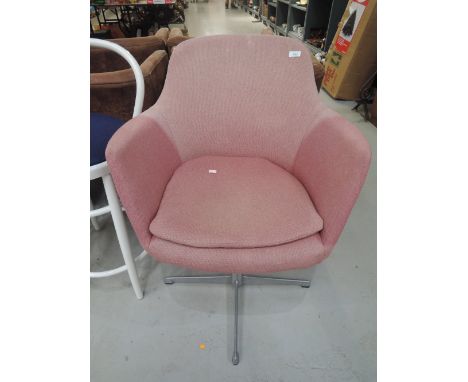 A vintage swivel office chair