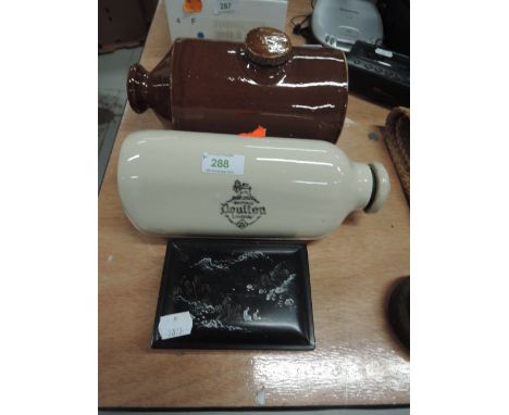 Three graduated lacquered trinket boxes and two ceramic bed warmers including DoultonsCONDITION REPORT - GOOD CONDITION SLIGH