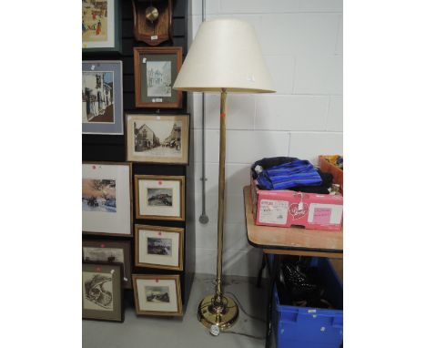 A  modern brass standard lamp