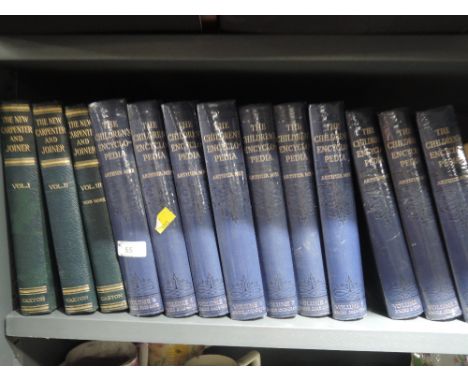 A selection of vintage volumes including carpentry