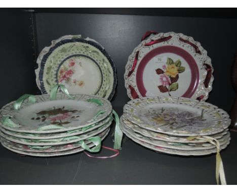 A selection of ceramic ribbon edged display plates 