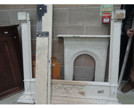 A cast fire place, grate, Adams style surround, stone mantel etc