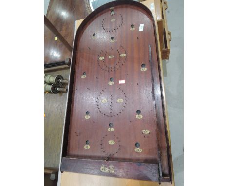 A vintage bagatelle board