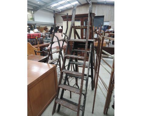Three sets of vintage step ladders