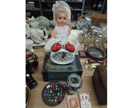 A vintage child celluloid doll