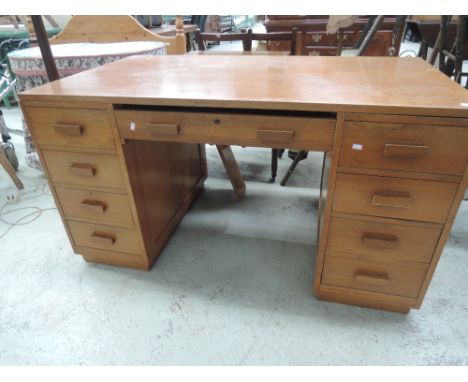 A vintage golden oak deskApprox L138cm x D 78cm x H 76cmWorn, no major damage