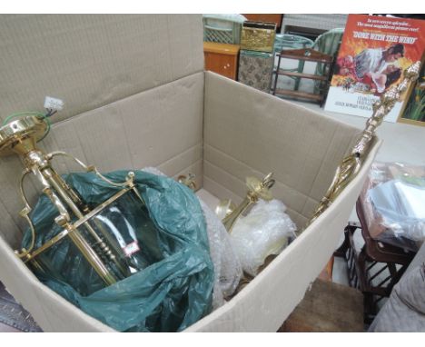 A selection of brass light fittings and fire tools