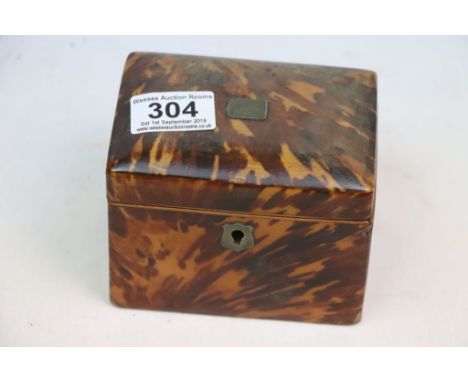 Tortoishell tea caddy of rectangular form, brass cartouche and escutcheon, tortoiseshell lid to interior, velvet lined lid, h