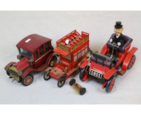 Two Japanese Tin Plate Toys of Vintage Cars together with a Tin Plate Bus