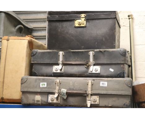 Three vintage suitcases and one other