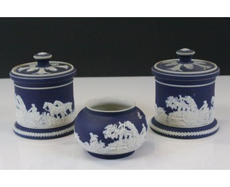 Pair of Adams Tunstall Jasperware cannisters with lids, both with Hunting scenes and a sugar bowl with similar design, cannis